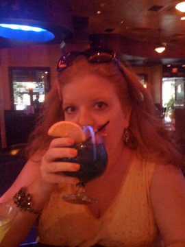 Hollie posing with MY drink  (something blue) 